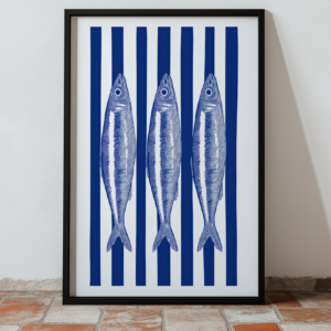 Framed wall art featuring three sardines on blue and white stripes.