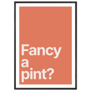 Framed wall art print with minimalist typography on a coral background.