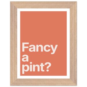 Framed wall art print featuring minimalist typography on orange background.