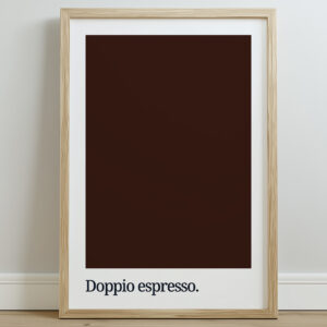 A framed print featuring a dark brown color swatch with the text "Doppio espresso." in bold, lowercase typography at the bottom, set against a light wall.