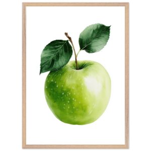 A green apple with a glossy surface and two leaves, displayed in a light wooden frame against a white background.