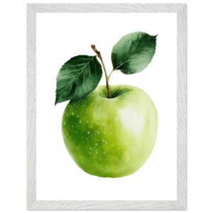 A green apple with a glossy surface and two green leaves, displayed in a white wooden frame against a plain white background.