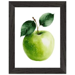 A vibrant green apple with two leaves, set against a white background, framed in a black wooden frame.
