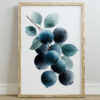A framed watercolor illustration of blueberries with green leaves, featuring varying shades of blue and teal, set against a white background.